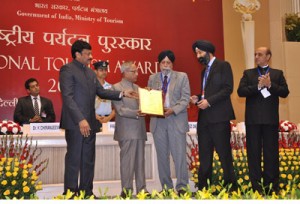 Mr. Harinder Singh (MD) & Mr. Harmeet Singh (Director) of Delhi Airport Service Pvt Ltd, receiving the National Tourism Award for the year 2011-12 under the Approved Tourist Transporters category from Hon. President of India Mr. Pranab Mukherjee & Minister of State for Tourism Dr. K. Chiranjeevi.